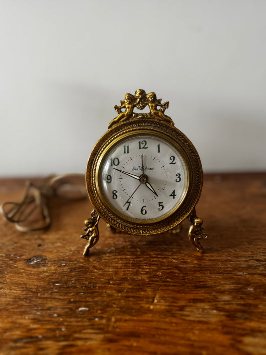 Vintage Saks Fifth Avenue Gold tone Plug-in Clock Cherub Designed